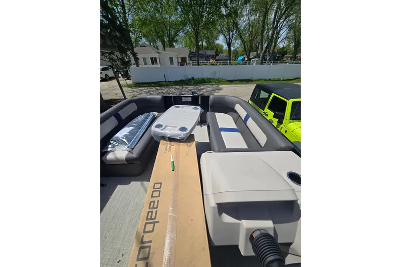 Slide: The Image of 2026 Princecraft Brio 17 Electric boat interior with seating and packaged accessories. - 7