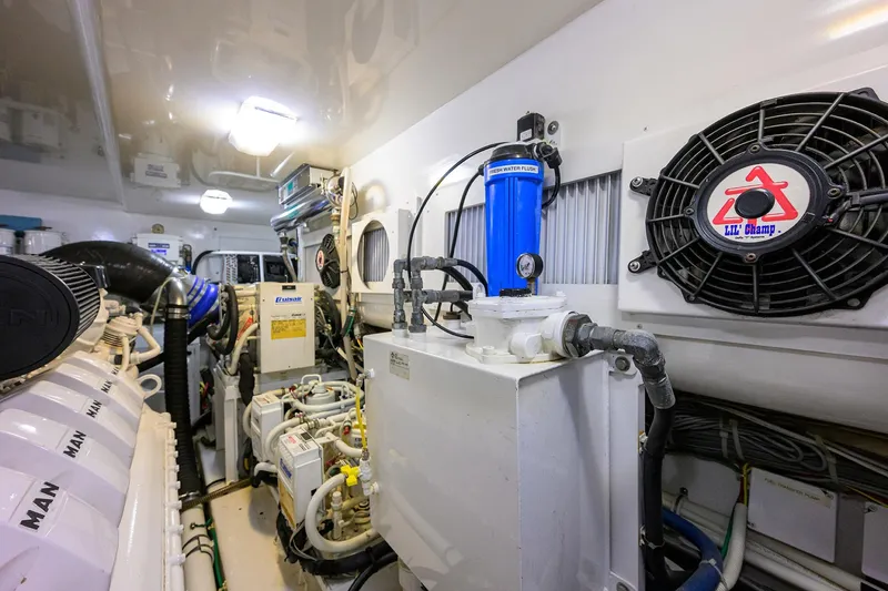 Slide: The Image of Engine room of 2015 Viking 52 Open yacht, showcasing machinery and equipment. - 71