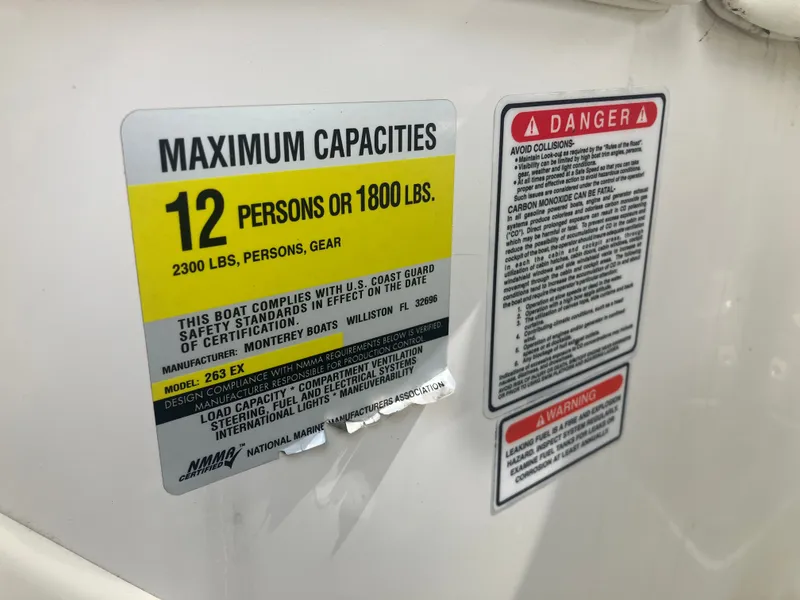 Slide: The Image of Safety label on Monterey 263 ES boat, maximum capacity 12 persons. - 16