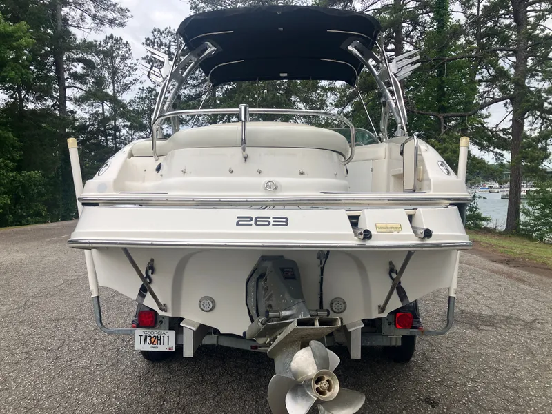 Slide: The Image of Rear view of a 2006 Monterey 263 ES boat on a trailer. - 6