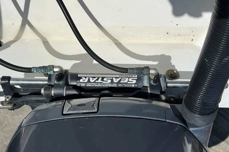 Slide: The Image of Close-up of Seastar hydraulic steering system on 2005 Contender 31 Fisharound boat. - 15