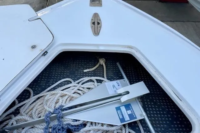 Slide: The Image of Anchor and ropes in a 2005 Contender 31 Fisharound boat compartment. - 7