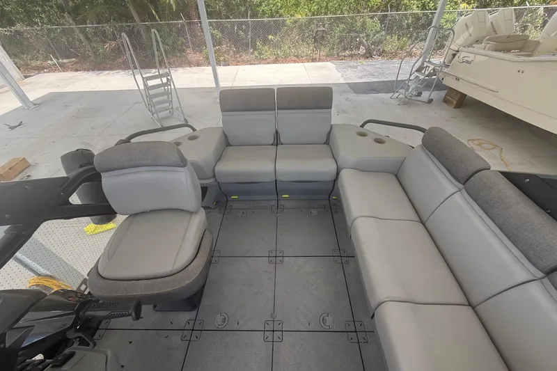 Slide: The Image of 2022 Sea-Doo Switch Sport 18 interior with gray seating and modular layout. - 5