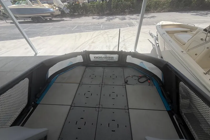 Slide: The Image of 2022 Sea-Doo Switch Sport 18 deck view, showcasing spacious layout and modern design. - 7