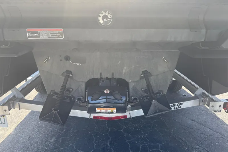 Slide: The Image of Rear view of 2022 Sea-Doo Switch Sport 18 on trailer, showcasing hull and components. - 9