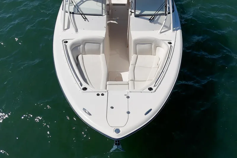 Slide: The Image of 2016 Grady-White Freedom 335 boat with spacious seating on calm water. - 10