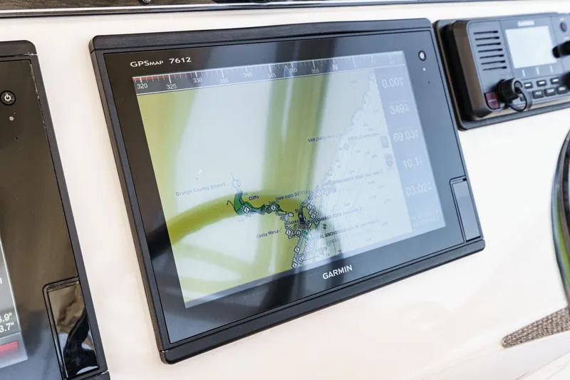 Slide: The Image of Garmin GPS display on 2016 Grady-White Freedom 335 boat dashboard. - 22