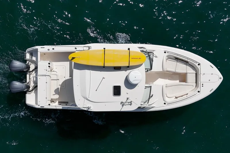 Slide: The Image of Overhead view of 2016 Grady-White Freedom 335 boat with yellow kayak on deck. - 8