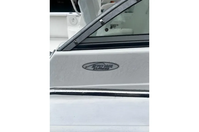 The Image of 2007 Sea Pro 270 Walk Around boat detail with model emblem visible. - 1