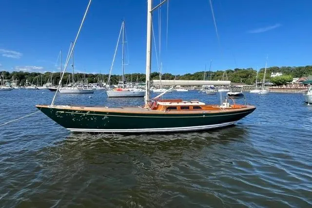 Slide: The Image of Sailboat on water, Morris 36 model, 2006, with clear blue sky and marina background. - 1