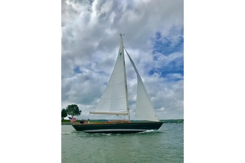 Slide: The Image of Sailing yacht Morris 36 (2006) gliding on water under cloudy sky. - 7