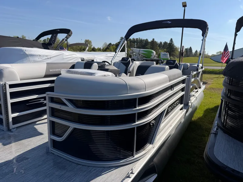 Slide: The Image of 2026 Bennington S-1 22 SSR Twin Tube pontoon boat outdoors. - 4