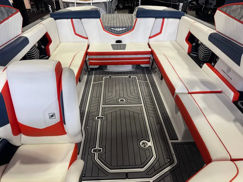 Slide: The Image of Interior of 2019 Nautique Super Air Nautique G25 with red accents. - 23