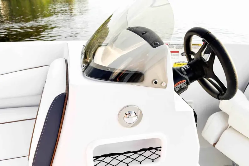 Slide: The Image of Interior view of 2026 Stingray 172 DC boat cockpit. - 8