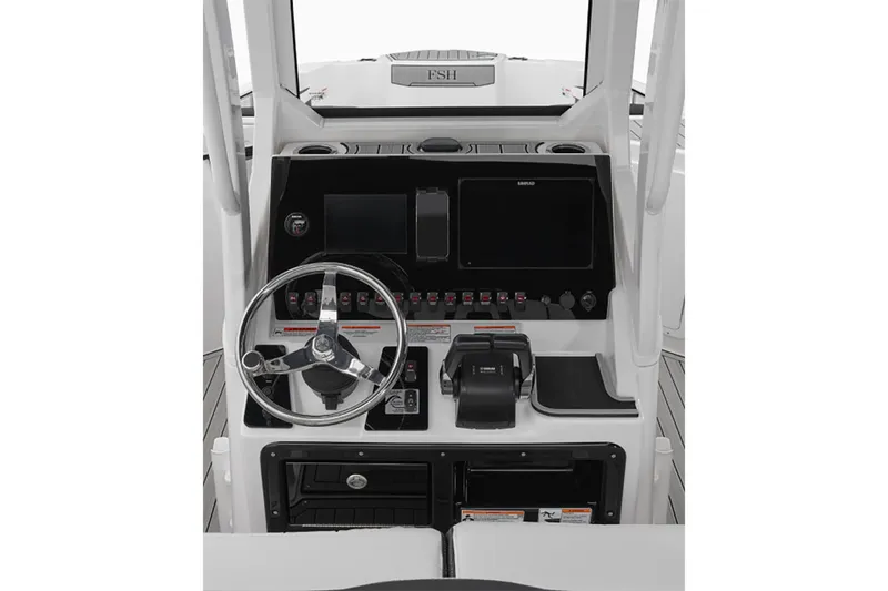 Slide: The Image of Yamaha Boats 252 FSH Sport 2025 helm with steering wheel and controls. - 4