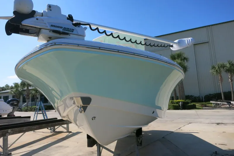 Slide: The Image of 2018 Robalo 246 Cayman boat on display, featuring sleek design and modern equipment. - 3