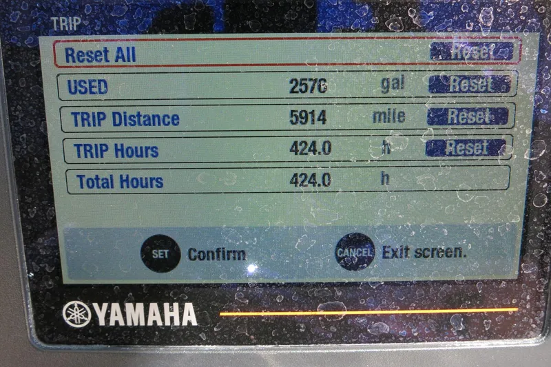 Slide: The Image of Yamaha display showing trip data: 2576 gallons used, 5914 miles traveled, 424 hours total. - 34