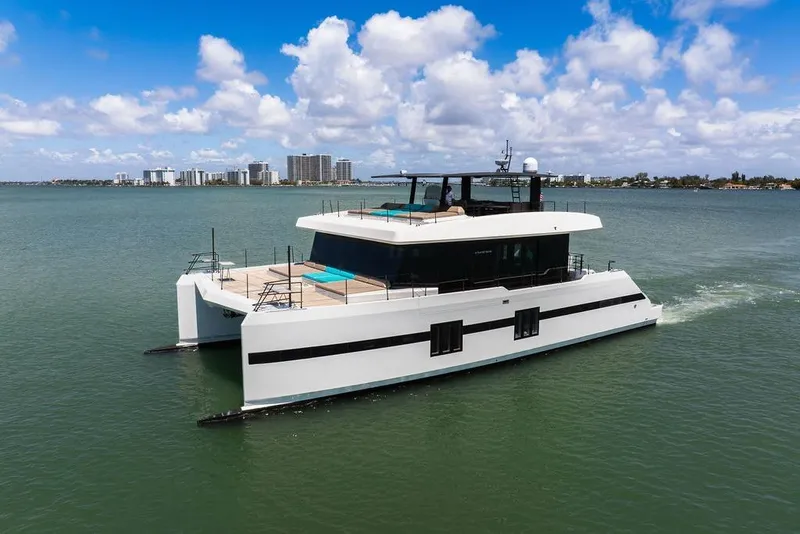 Slide: The Image of Luxurious 2018 Sunreef 68 Supreme yacht cruising on a sunny day. - 1
