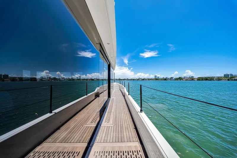 Slide: The Image of Luxurious Sunreef 68 Supreme yacht deck with stunning ocean view, 2018 model. - 12