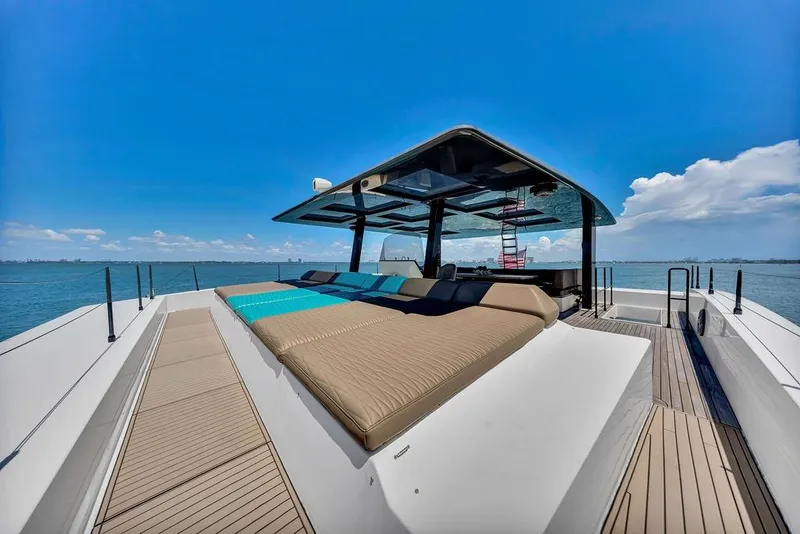 Slide: The Image of Luxurious 2018 Sunreef 68 Supreme yacht with spacious deck and sunbeds on open water. - 17