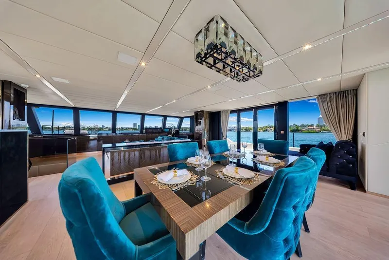 Slide: The Image of Luxurious interior of 2018 Sunreef 68 Supreme yacht with elegant dining area and panoramic windows. - 19