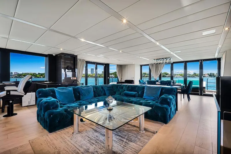 Slide: The Image of Luxurious interior of 2018 Sunreef 68 Supreme yacht with plush seating and panoramic windows. - 20