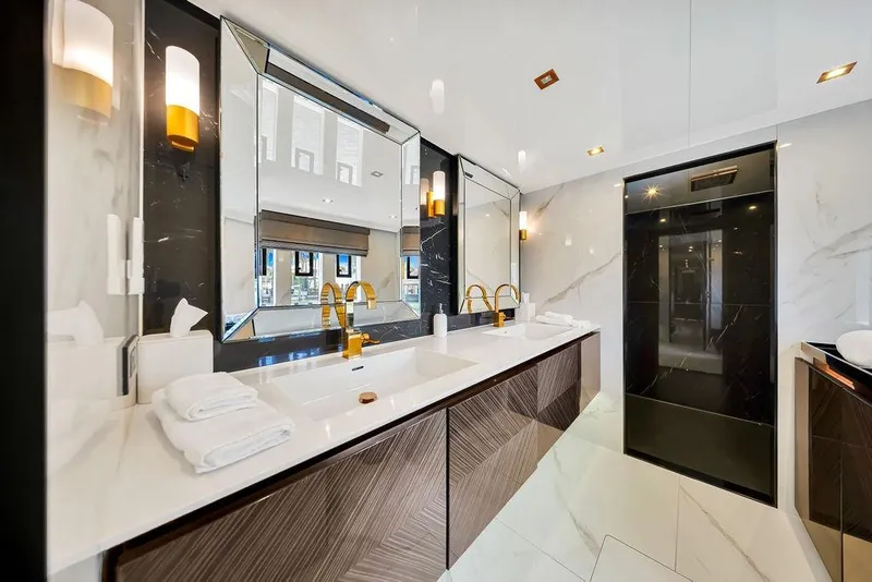 Slide: The Image of Luxurious bathroom on 2018 Sunreef 68 Supreme yacht with dual sinks and elegant lighting. - 34