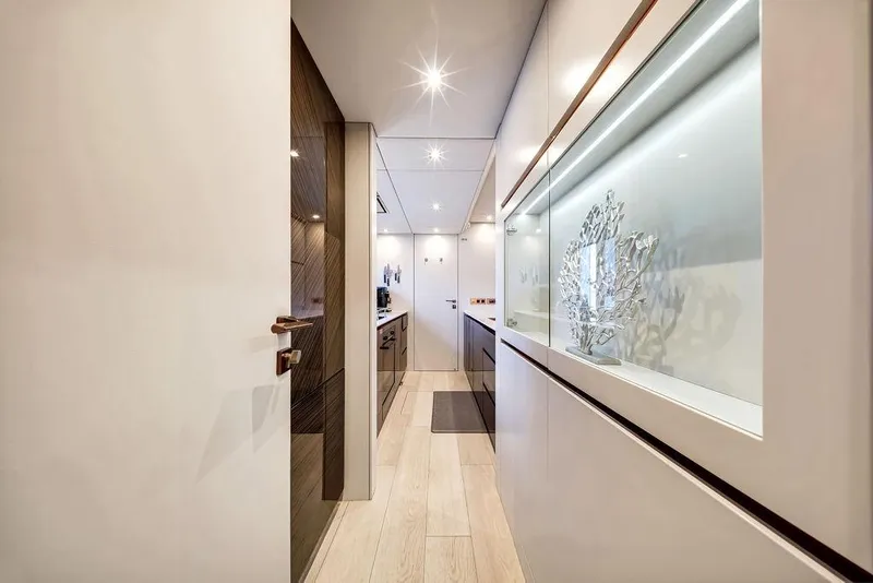 Slide: The Image of Luxurious interior hallway of 2018 Sunreef 68 Supreme yacht, featuring modern design elements. - 37