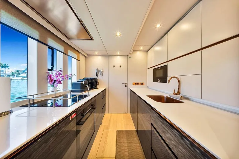 Slide: The Image of Luxurious kitchen interior of 2018 Sunreef 68 Supreme yacht with modern appliances and ocean view. - 39