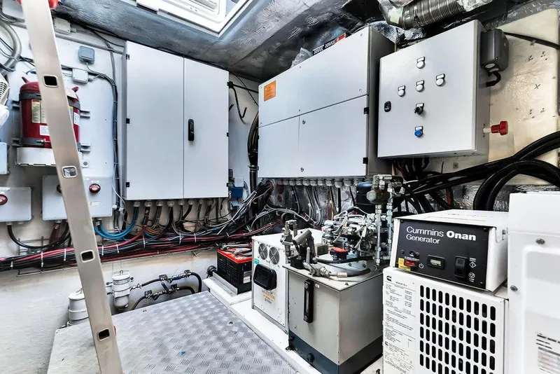 Slide: The Image of Engine room of 2018 Sunreef 68 Supreme yacht with Cummins Onan generator and control panels. - 42