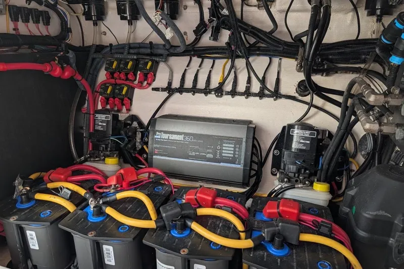 Slide: The Image of Electrical system of a 2018 Fountain 38 Center Console boat with batteries and wiring. - 19