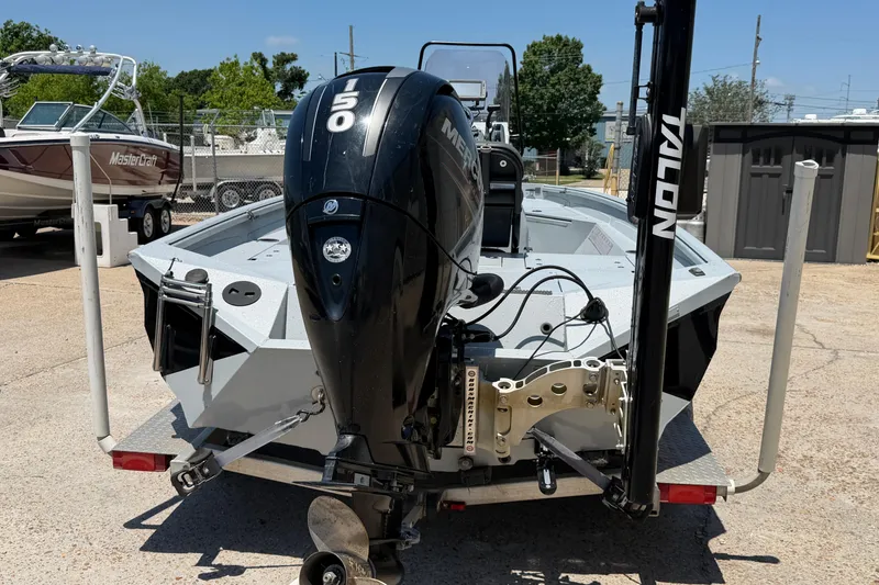 Slide: The Image of 2018 Excel 203 Bay Pro boat with Mercury 150 engine on trailer. - 4