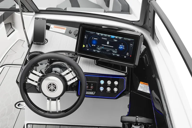 Slide: The Image of Manufacturer Provided Image: 2026 Yamaha Boats 222XD dashboard with touchscreen display and modern steering wheel. - 6