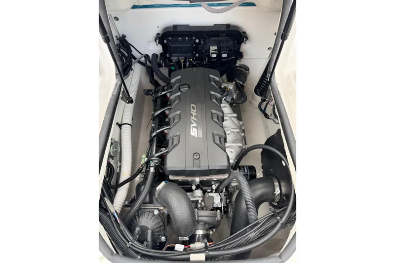 Slide: The Image of Engine compartment of 2026 Yamaha Boats AR195 with powerful engine. - 16
