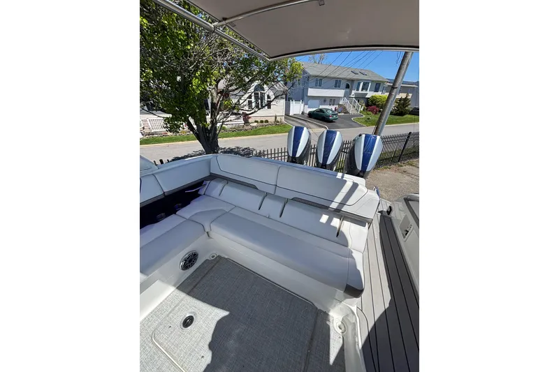 Slide: The Image of 2023 Formula 350 Crossover Bowrider OB with spacious seating and triple outboard engines. - 17
