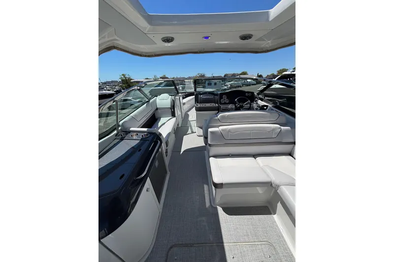 Slide: The Image of 2023 Formula 350 Crossover Bowrider OB interior with luxurious seating and modern dashboard. - 19
