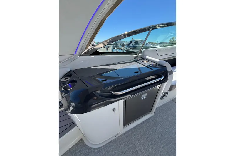 Slide: The Image of 2023 Formula 350 Crossover Bowrider OB interior with sleek kitchenette and modern design. - 20
