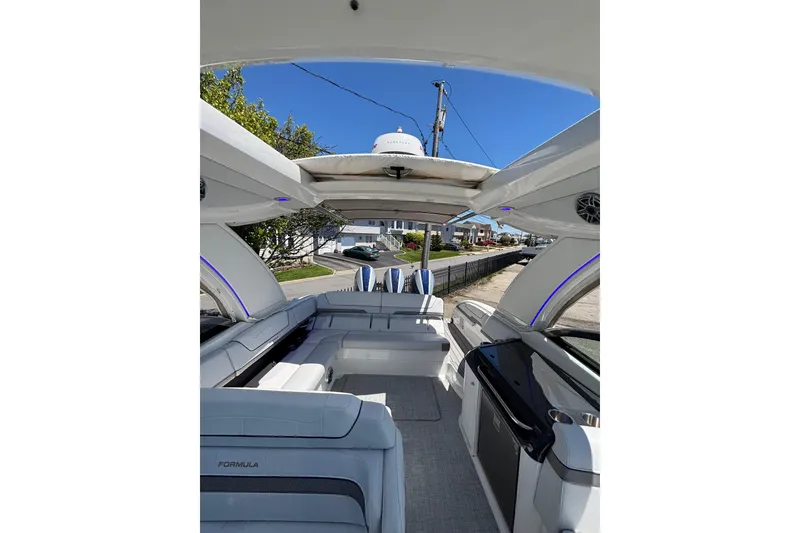 Slide: The Image of 2023 Formula 350 Crossover Bowrider OB interior with luxurious seating and modern amenities. - 27