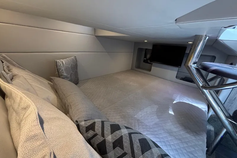 Slide: The Image of Luxurious interior cabin of 2023 Formula 350 Crossover Bowrider OB with plush bedding. - 37