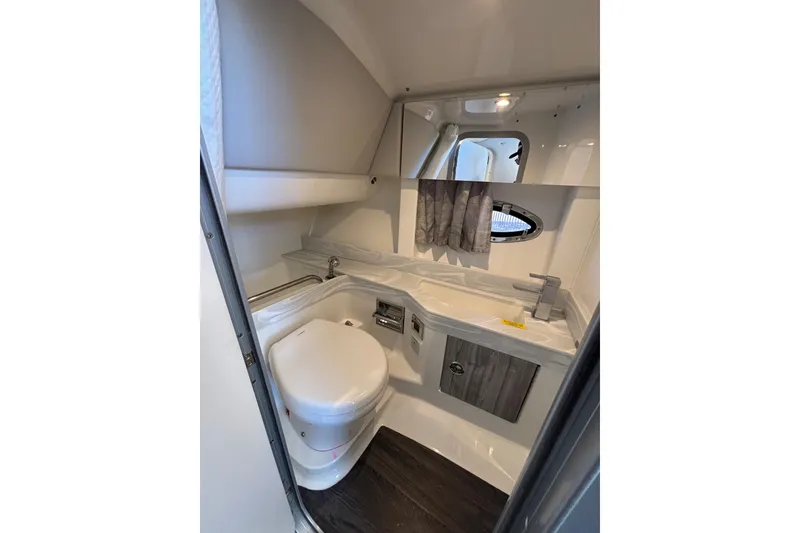 Slide: The Image of 2023 Formula 350 Crossover Bowrider OB bathroom with modern fixtures and compact design. - 39