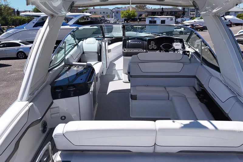 Slide: The Image of 2023 Formula 350 Crossover Bowrider OB interior with luxurious seating and modern design. - 6