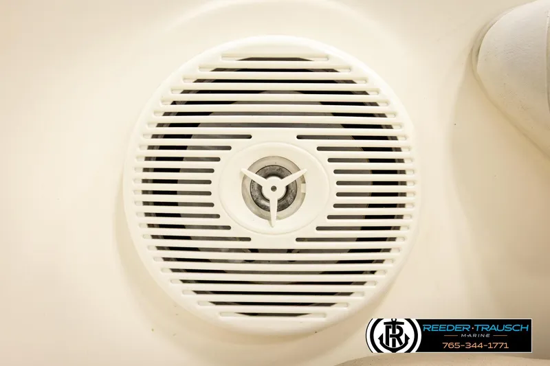 Slide: The Image of 2007 Glastron GXL 205 boat speaker with Reeder-Trausch Marine branding. - 44