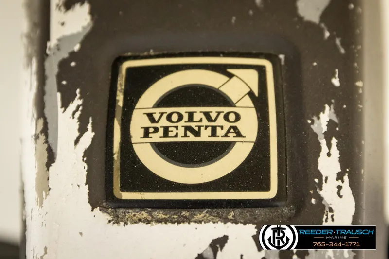 Slide: The Image of Volvo Penta logo on a 2007 Glastron GXL 205 boat engine component. - 49