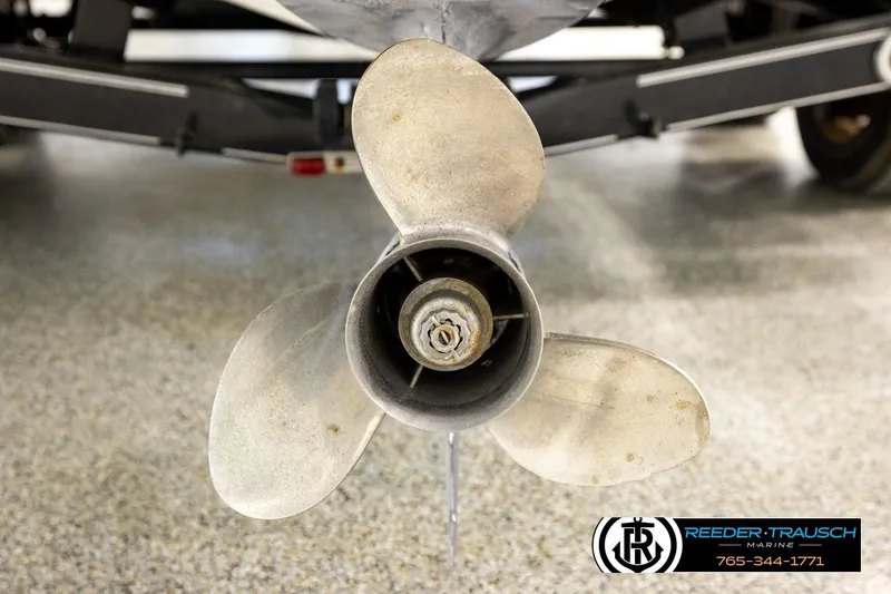 Slide: The Image of Propeller of a 2007 Glastron GXL 205 boat on display in a showroom. - 50