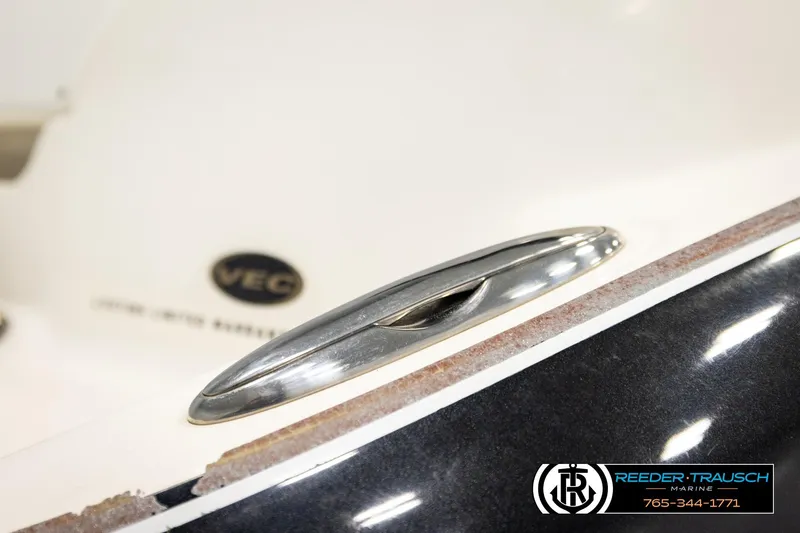 Slide: The Image of 2007 Glastron GXL 205 boat detail with chrome cleat and VEC logo. - 55