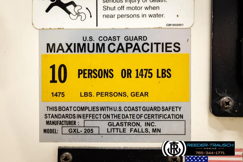 Slide: The Image of 2007 Glastron GXL 205 capacity label, 10 persons or 1475 lbs, U.S. Coast Guard compliant. - 57