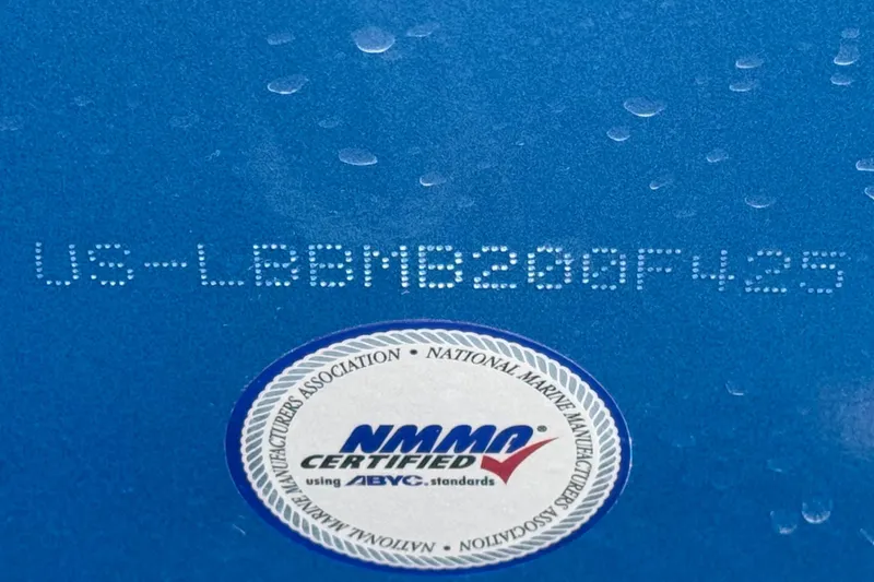 Slide: The Image of 2025 Lund 1650 Angler SS boat with NMMA certification and hull identification number. - 24