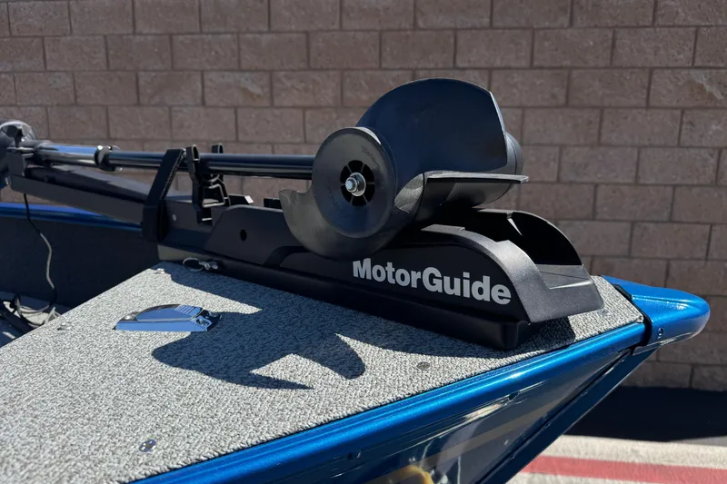 Slide: The Image of 2025 Lund 1650 Angler SS boat with MotorGuide trolling motor on deck. - 9