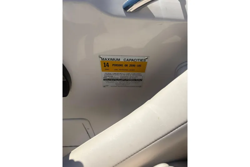 Slide: The Image of 2000 Chaparral Sunesta 232 capacity label, maximum 14 persons or 2090 lbs. - 11