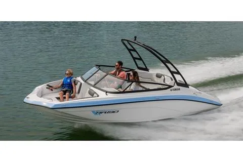 Slide: The Image of 2026 Yamaha Boats AR190 speeding on water with passengers enjoying the ride. - 11